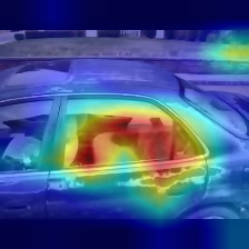 Grad-CAM heatmap overlay on a damaged vehicle door, correctly classified as 00-damage
